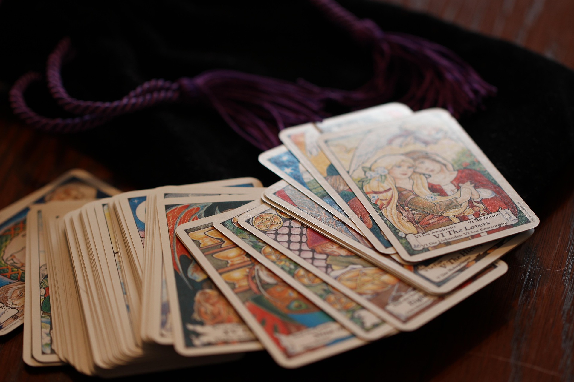 Tarot cards fanned out on a velvet cloth